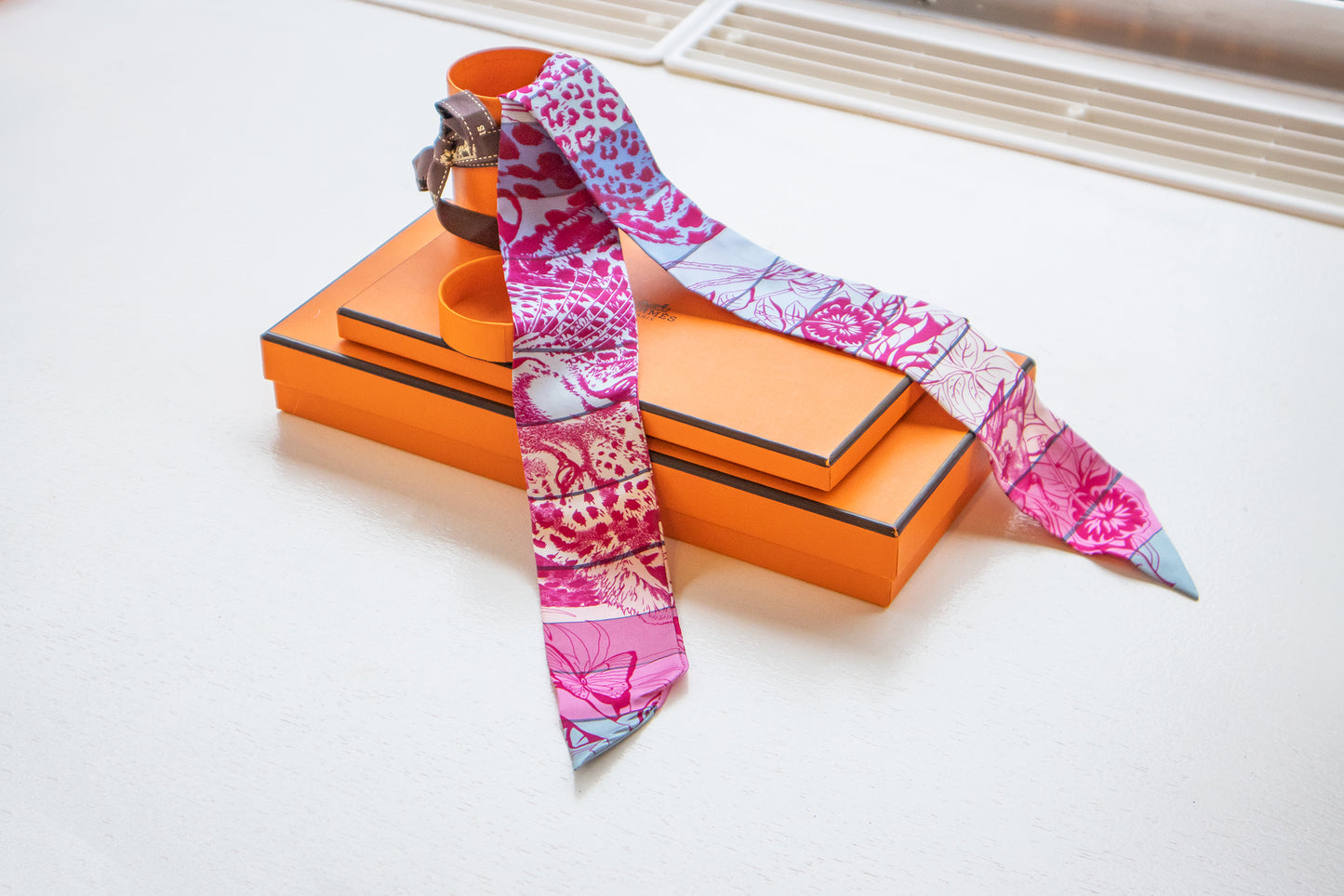 Hermès - Twilly Seide Rosa Leopard