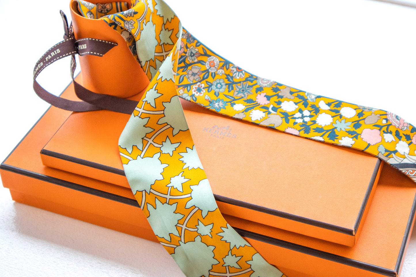 Hermès - Twilly Seide Blumenmuster