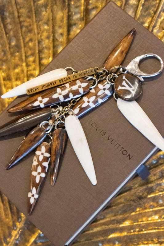 Louis Vuitton - Anhänger Horn "Every Journey begins in Africa"
