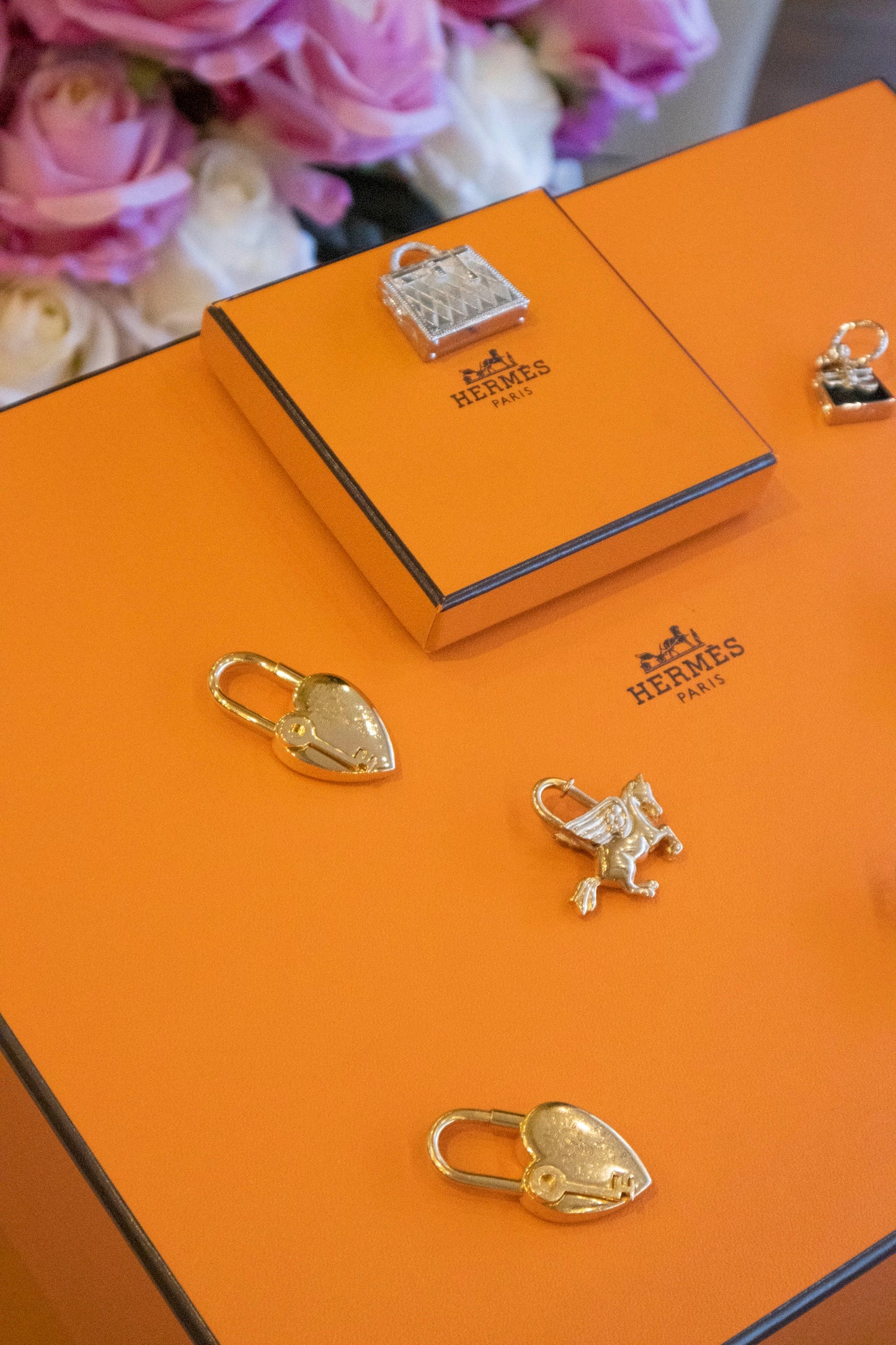 Hermès - Cadenas in silberfarbener & goldfarbener Ausführung