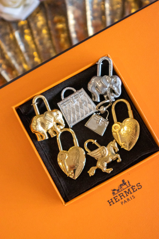 Hermès - Cadenas in silberfarbener & goldfarbener Ausführung