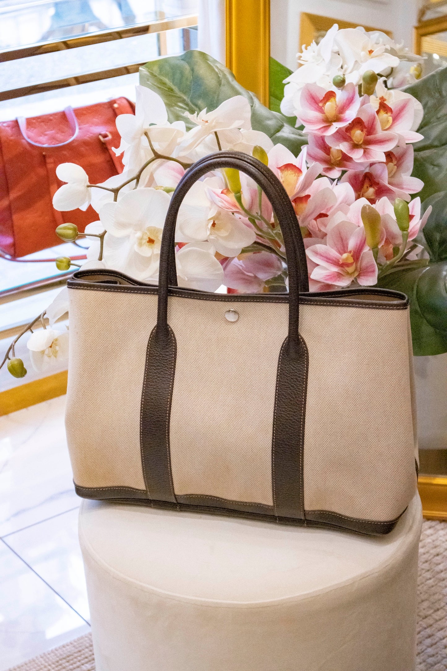 Hermès - Garden Party 36 aus beigefarbenem Canvas mit braunem Lederbesatz
