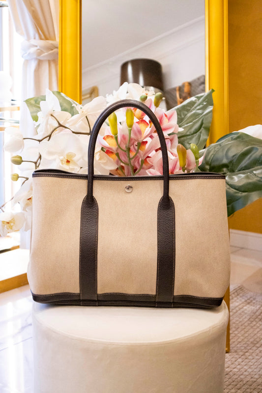 Hermès - Garden Party 36 aus beigefarbenem Canvas mit braunem Lederbesatz