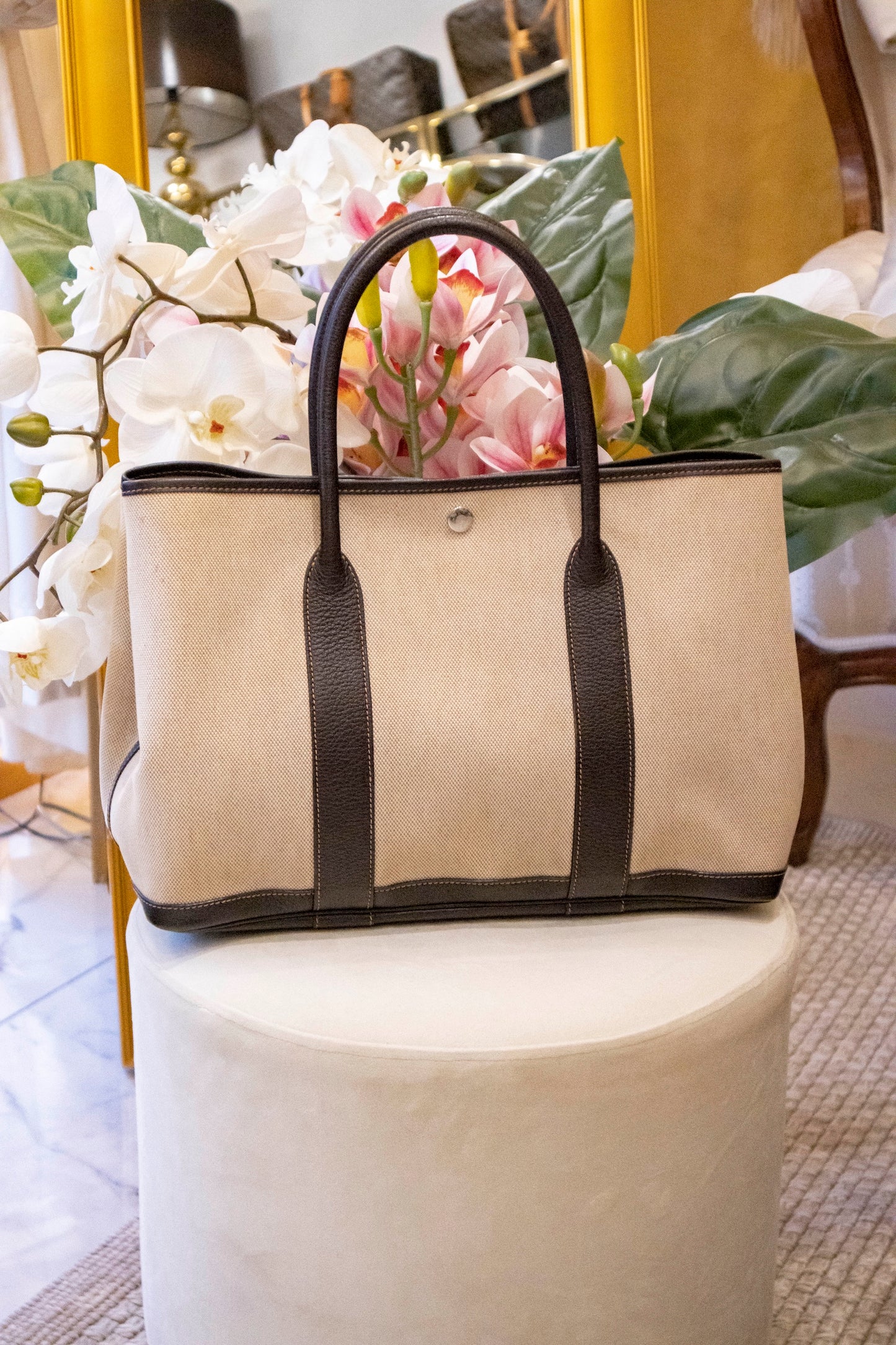 Hermès - Garden Party 36 aus beigefarbenem Canvas mit braunem Lederbesatz