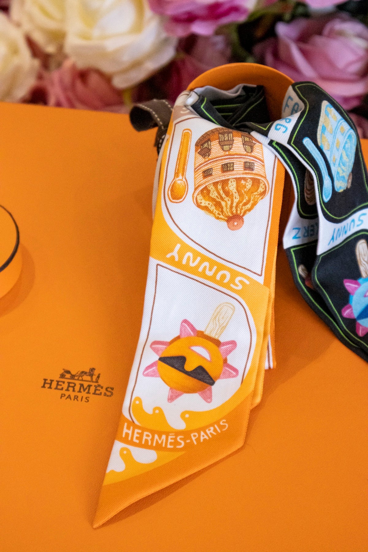 Hermès - Twilly Funny Sunny Ice Cream Orange and Black