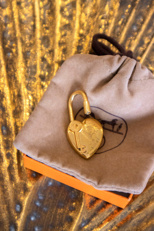 Hermès - Taschenschmuck aus Metall - Gold