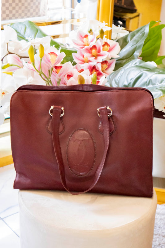 Cartier - Handtasche aus Leder in Bordeauxrot